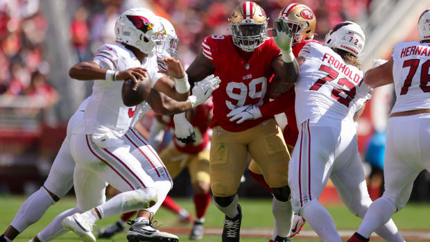 Oct 1, 2023; Santa Clara, California, USA; San Francisco 49ers defensive tackle Javon Kinlaw (99) rushes Arizona Cardinals quarterback Joshua Dobbs (9) during the second quarter at Levi's Stadium. Mandatory Credit: Sergio Estrada-USA TODAY Sports